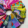 Collection of colorful fabric swatches arranged in a circular pattern. Anna Maria Fabric | Fat Quarter Bundle 1 