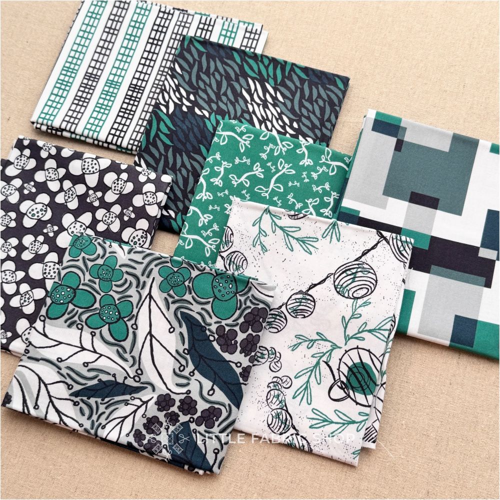 Collection of fabric swatches with various patterns on a beige background. Celebrate | Tracey Wirth Designs | Half Yard Bundle