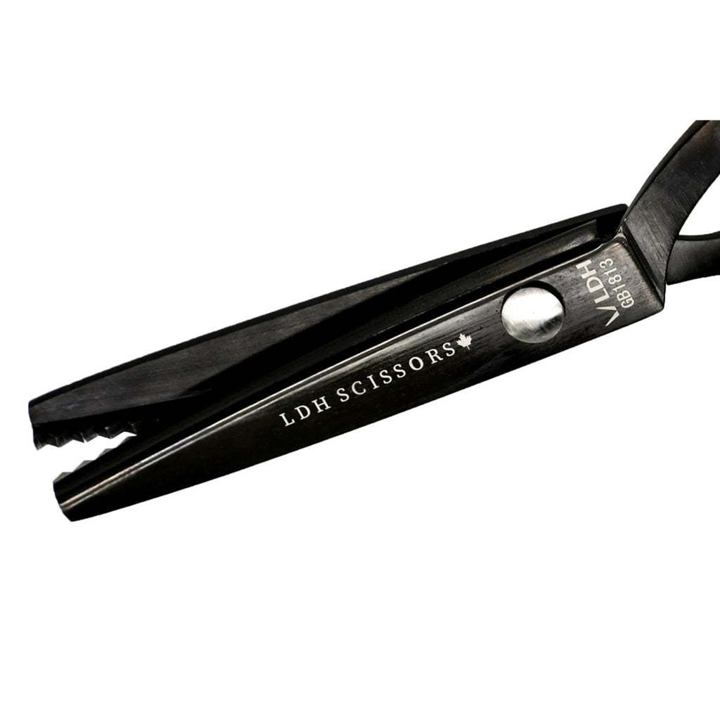 Black scissors with a silver button on a white background | Midnight Edition Pinking Shears | 8" Fabric Shears