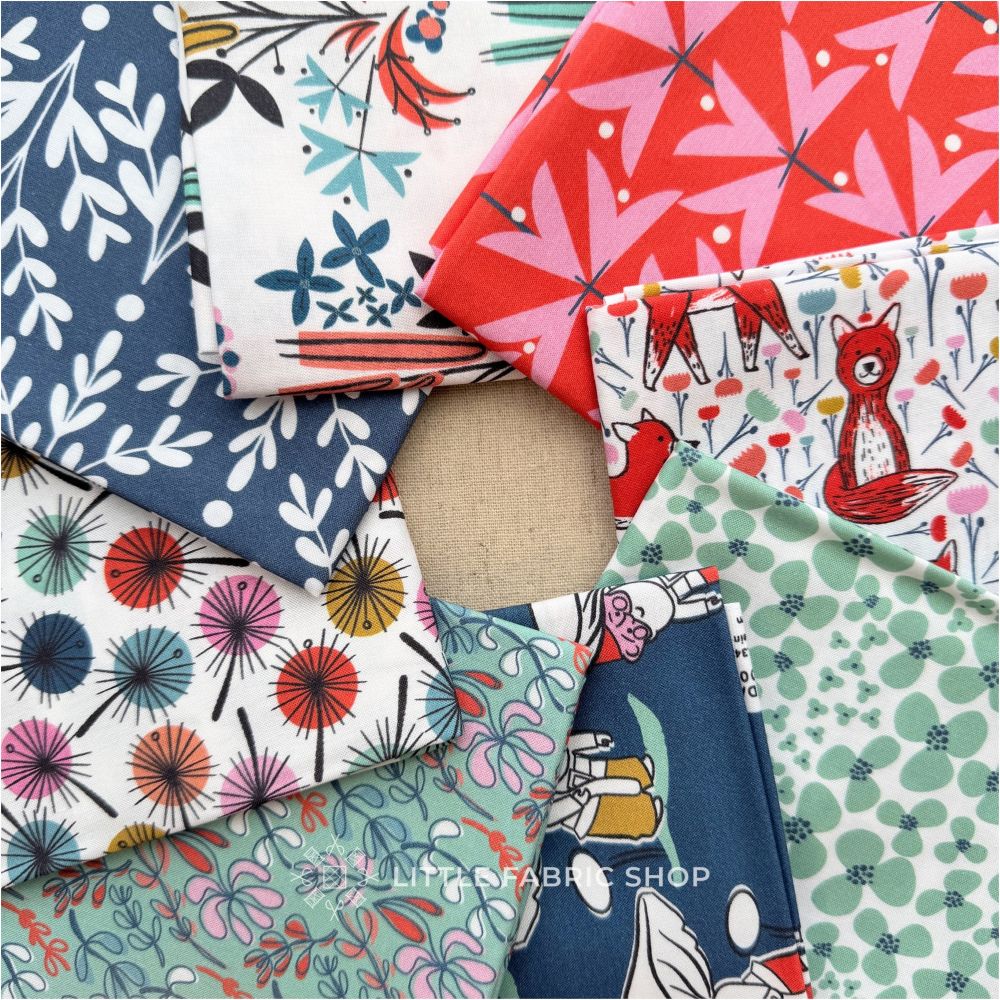 Collection of colorful fabric swatches with various patterns on a beige surface, featuring the 'Little Fabric Shop' brand. My Favorites | Tracey Wirth Designs | Fat Quarter Bundle