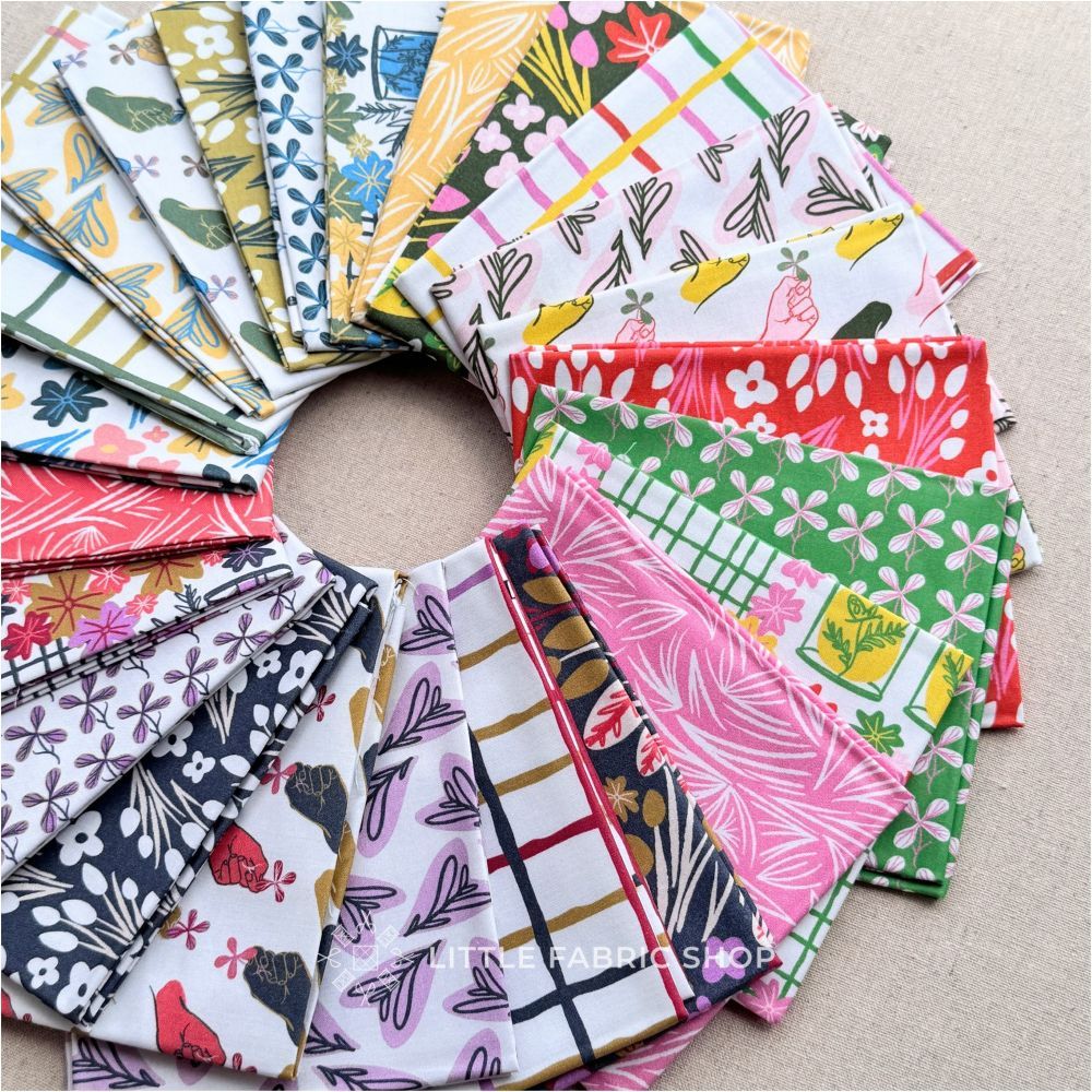 Collection of colorful fabric swatches arranged in a circular pattern on a beige surface. To Have and To Hold | Tracey Wirth Designs | Half Yard Bundle